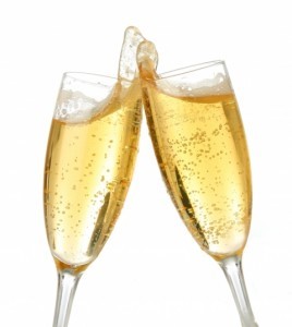 champagne glasses in a toast